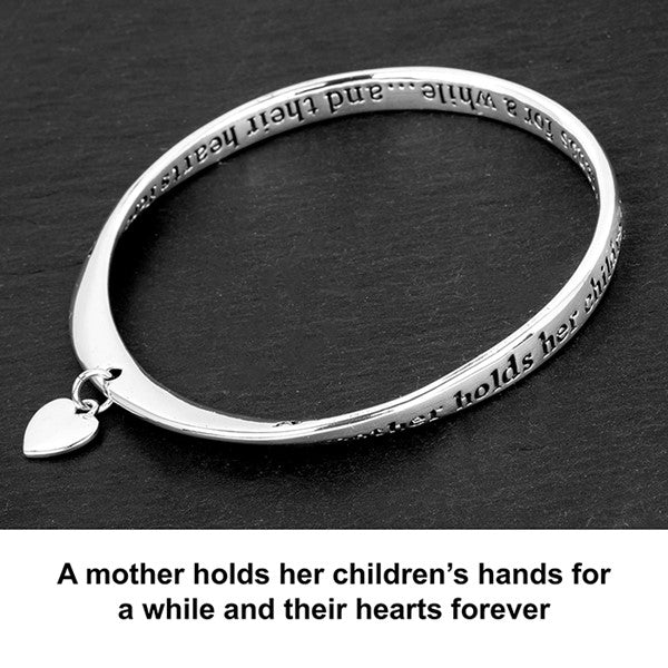 A Mother Holds Her Children&