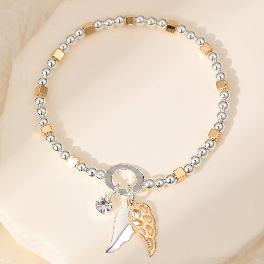 Angel Wing Silver Gold Beaded Stretch Bracelet - Sugarplum Boutique
