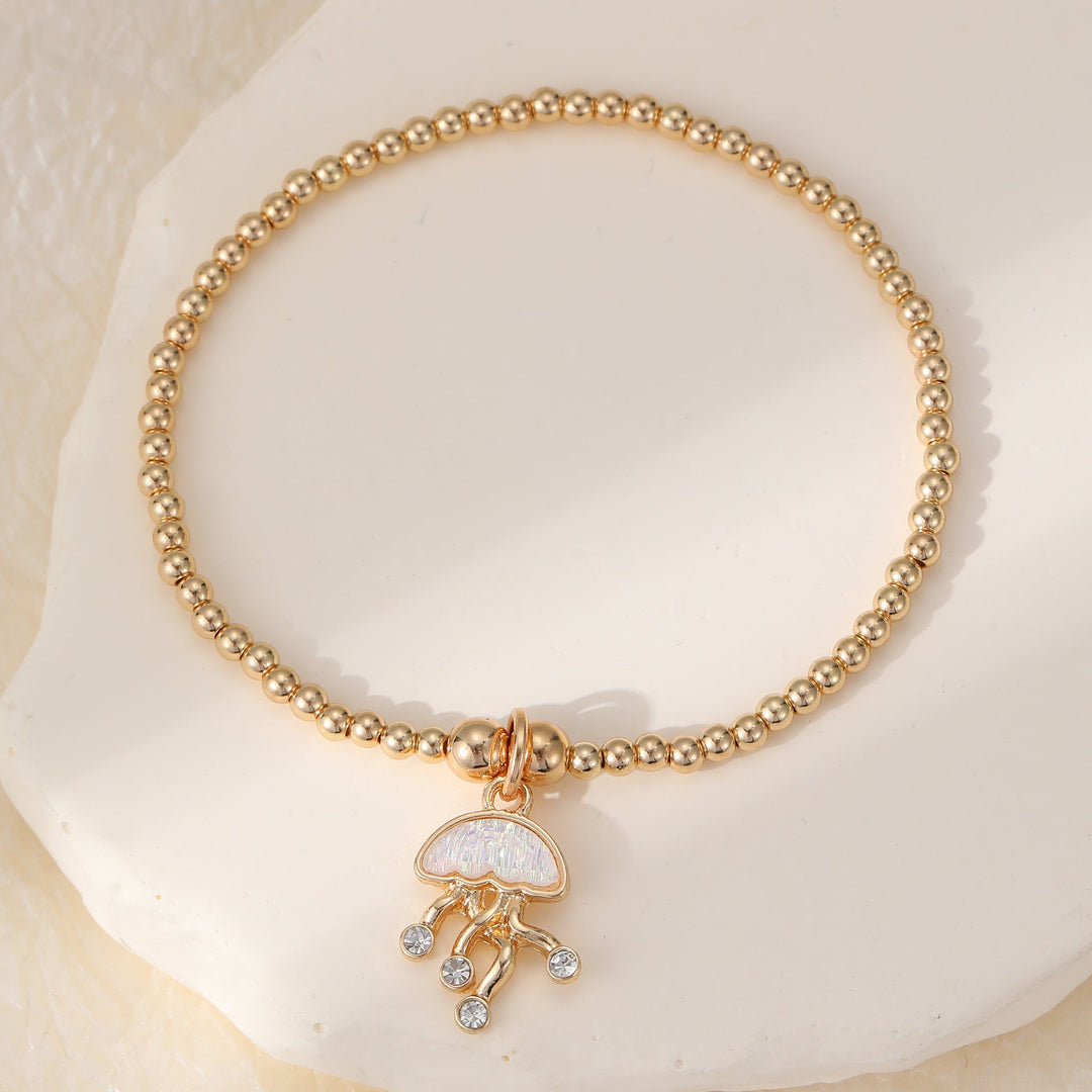 Jellyfish Beaded Charm Stretch Bracelet Gold - Sugarplum Boutique