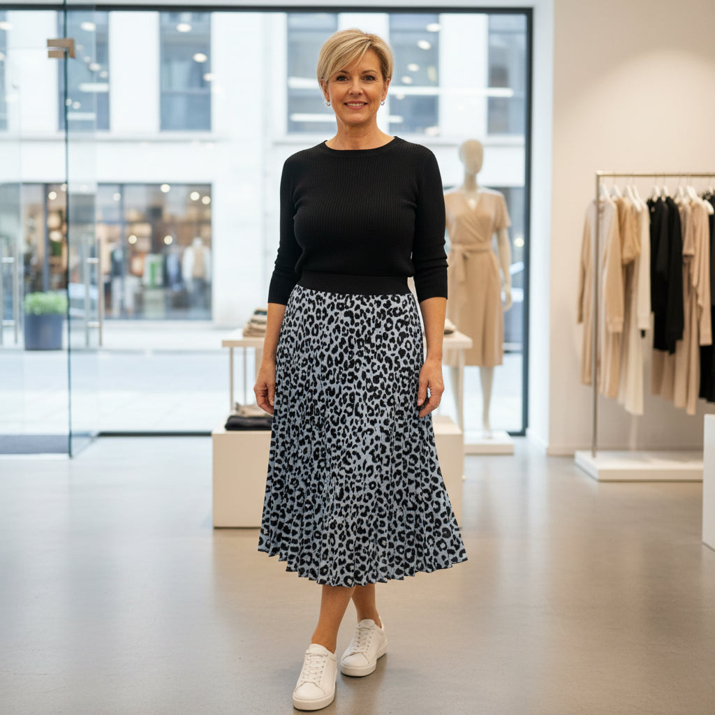 Made In Italy Ava Pale Blue Pleated Animal Print Skirt - Sugarplum Boutique