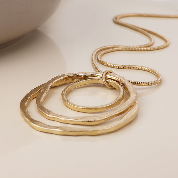 POM Luna Golden Worn Triple Beaten Ring Long Necklace - Sugarplum Boutique