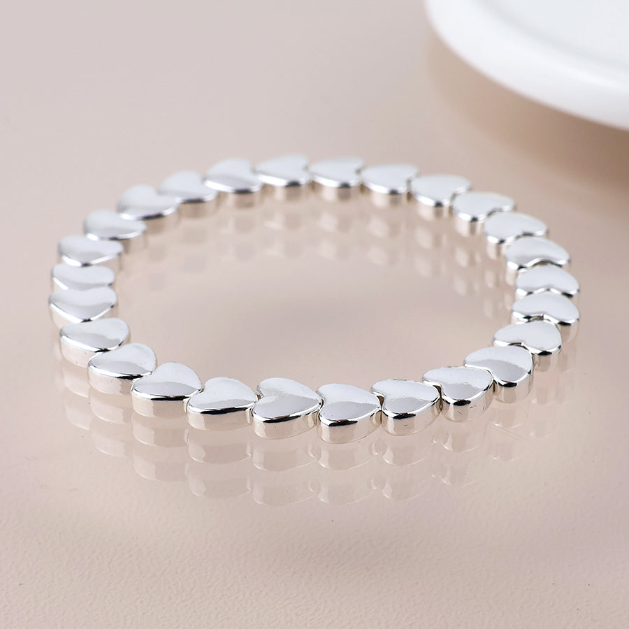 POM Silver Plated Polished Small Hearts Stretch Bracelet - Sugarplum Boutique