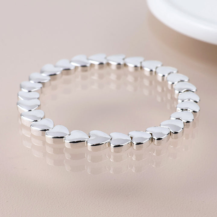 POM Silver Plated Polished Small Hearts Stretch Bracelet - Sugarplum Boutique