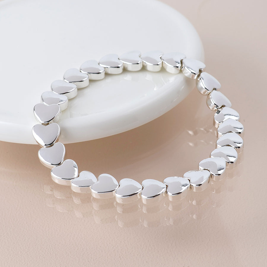 POM Silver Plated Polished Small Hearts Stretch Bracelet - Sugarplum Boutique