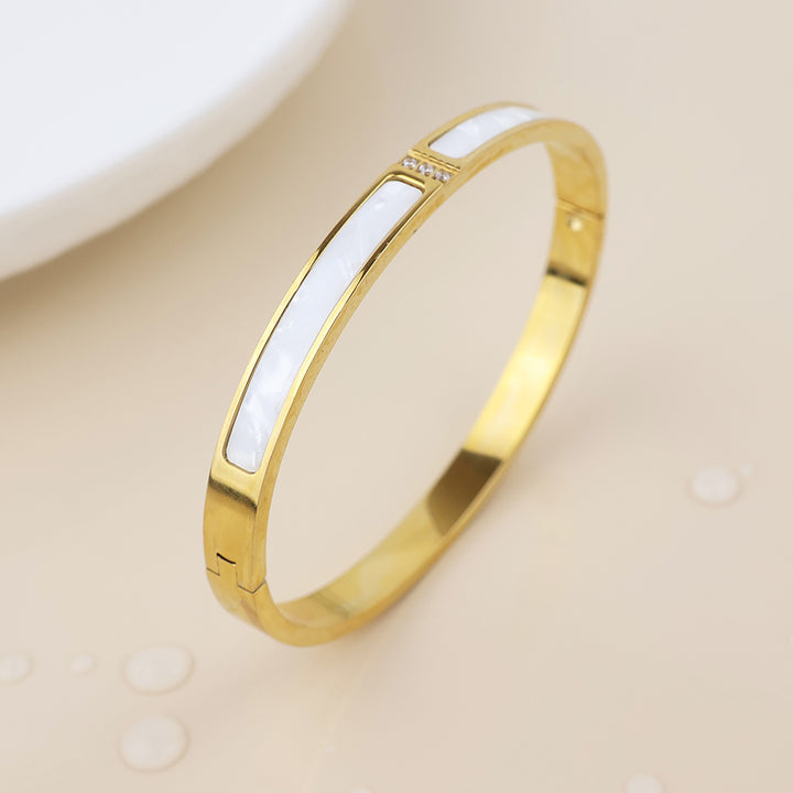 POM Waterproof Gold Plated White Shell Crystal Bangle - Sugarplum Boutique