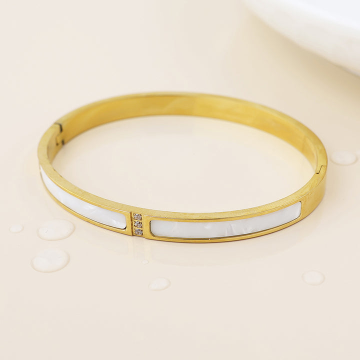 POM Waterproof Gold Plated White Shell Crystal Bangle - Sugarplum Boutique